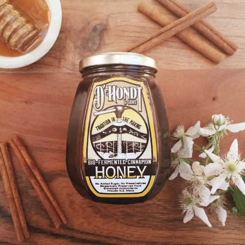 A jar of Bio-Fermented Cinnamon Honey with raw, unfiltered Nelson honey and bio-fermented organic cinnamon, known for its antioxidant-rich properties and health benefits.
